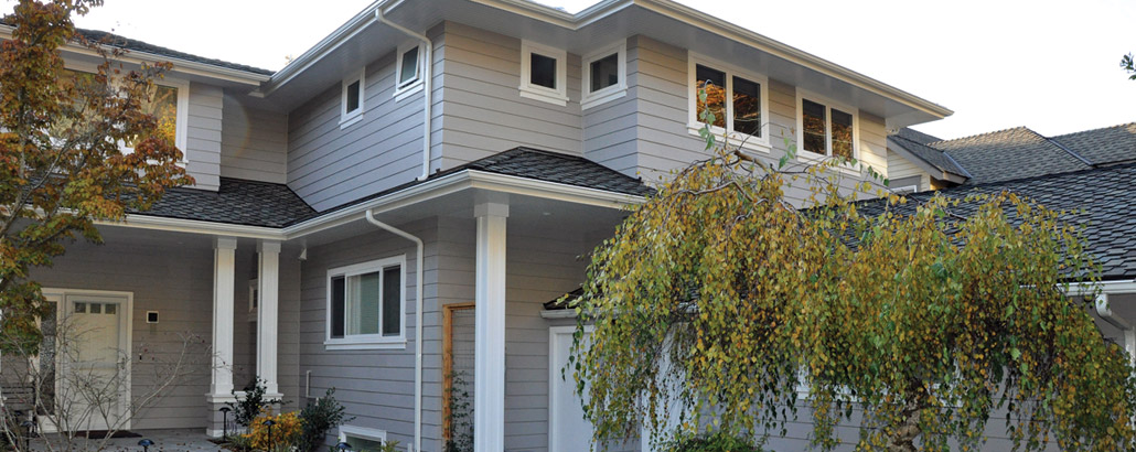 this project includes a main floor laundry room and entry addition, and a new full second story and deck