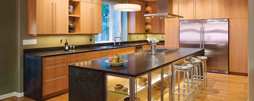 The vision was for a kitchen that both drew people in without making them feel like they were entering a cave room. West Seattle kitchen remodel