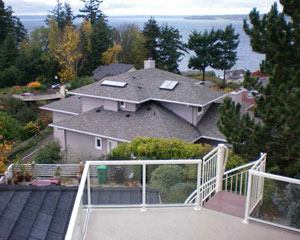 The new deck is expansive, and takes advantage of an area that was simply a flat roof.  The entire area was re-framed to carry the additional weight and the Weatherdek surface is both attractive and functional.  Now there's no trouble seeing the Olympics
