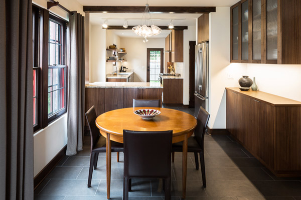 The effort to replicate Tudor details really pays off, with sculpted plaster door trims and windows and doors designed to match the originals