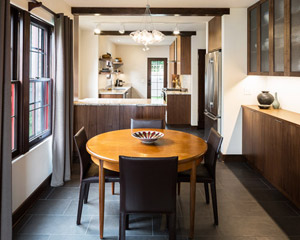 The effort to replicate Tudor details really pays off, with sculpted plaster door trims and windows and doors designed to match the originals