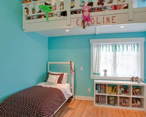 This kids' room has its own clubhouse'near the ceiling.  The unusually high ceilings in this room begged for a hideaway, and a place to keep all those stuffed animals