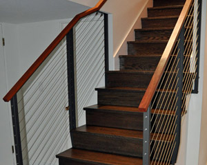 The new railings, treads and risers are visible from top and bottom and signal that the time for change has finally come to this '60s home.  Next phase--basement or kitchen?  We're looking forward to finding out