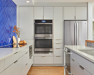 view of oven and fridge in kitchen remodel