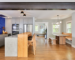 wide view of updated kitchen and seating