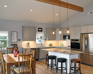Efficient use of main floor space and focus on gathering spaces