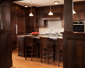 walnut custom kitchen cabinets with Azul Aran granite counters